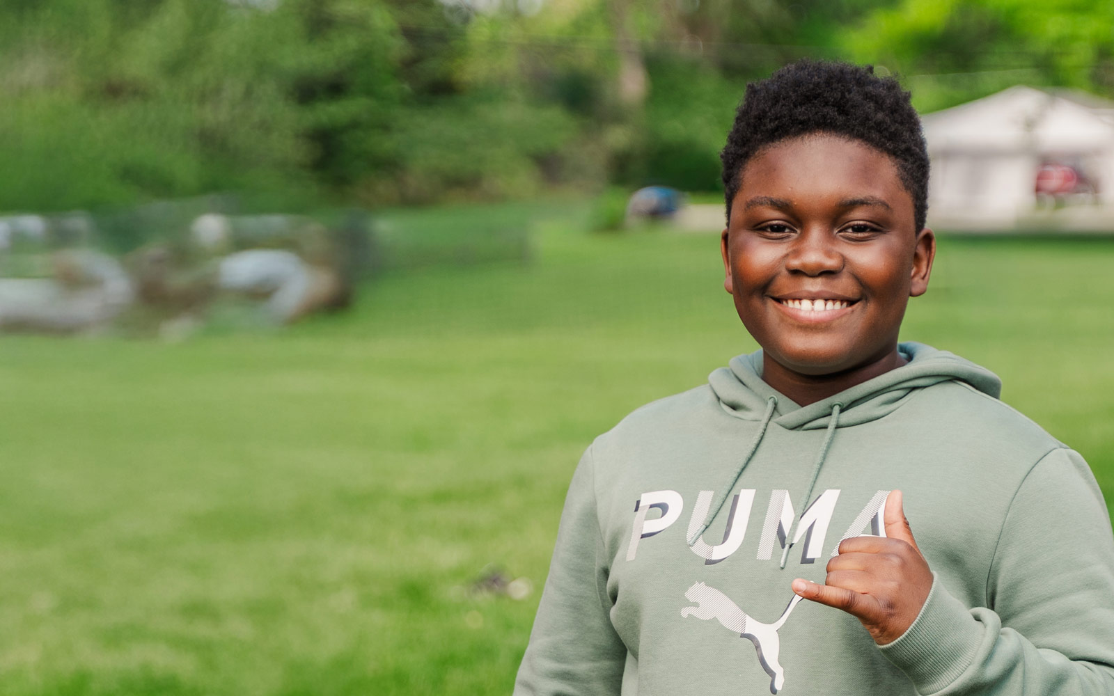 Young child smiling at the camera